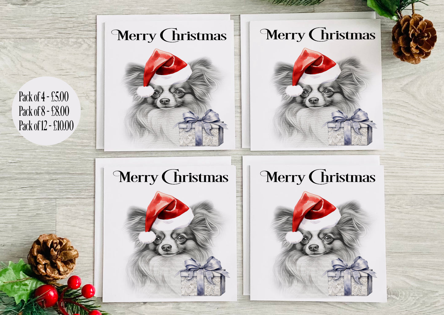 A Christmas card with a papillon dog breed