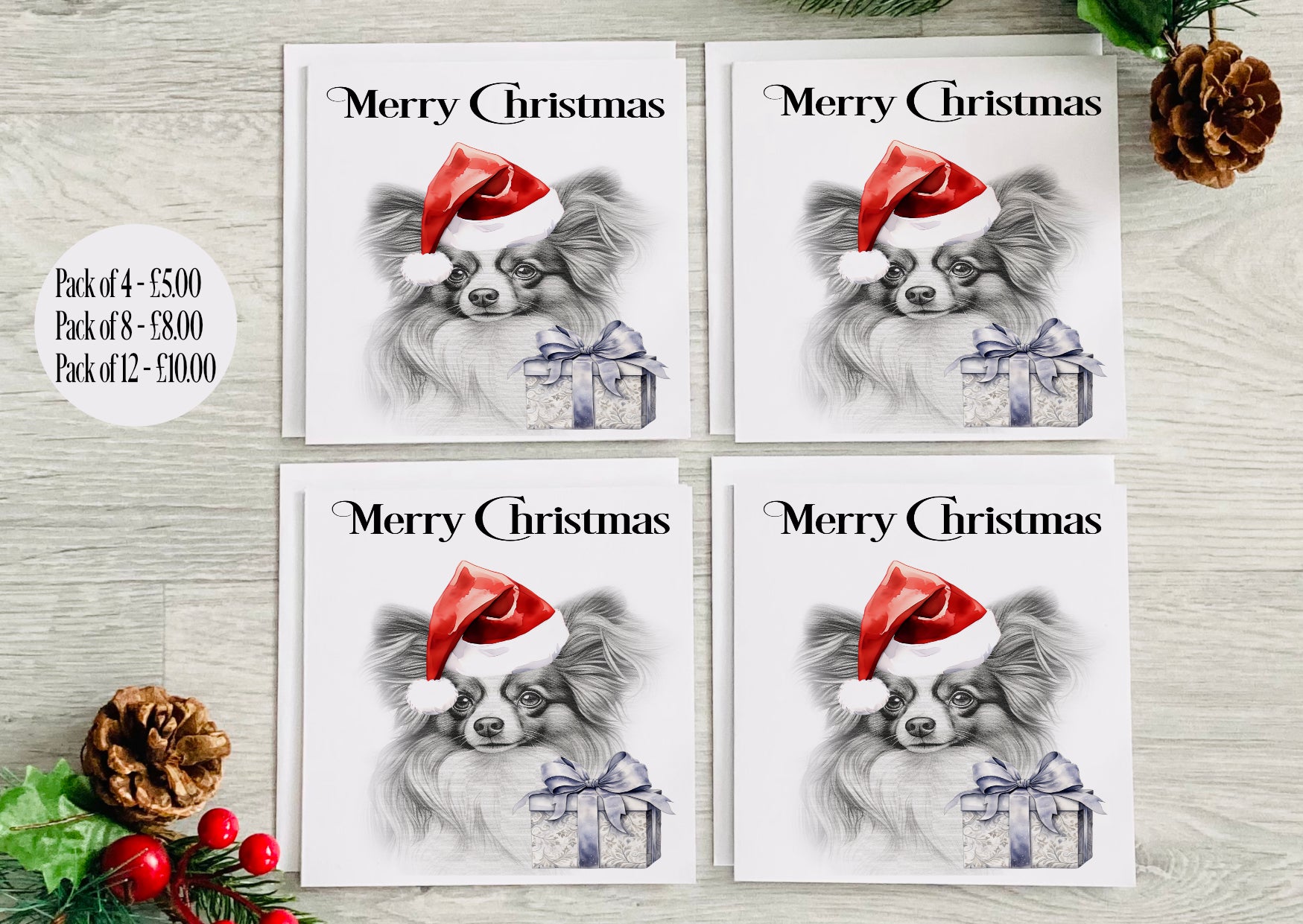 A Christmas card with a papillon dog breed 
